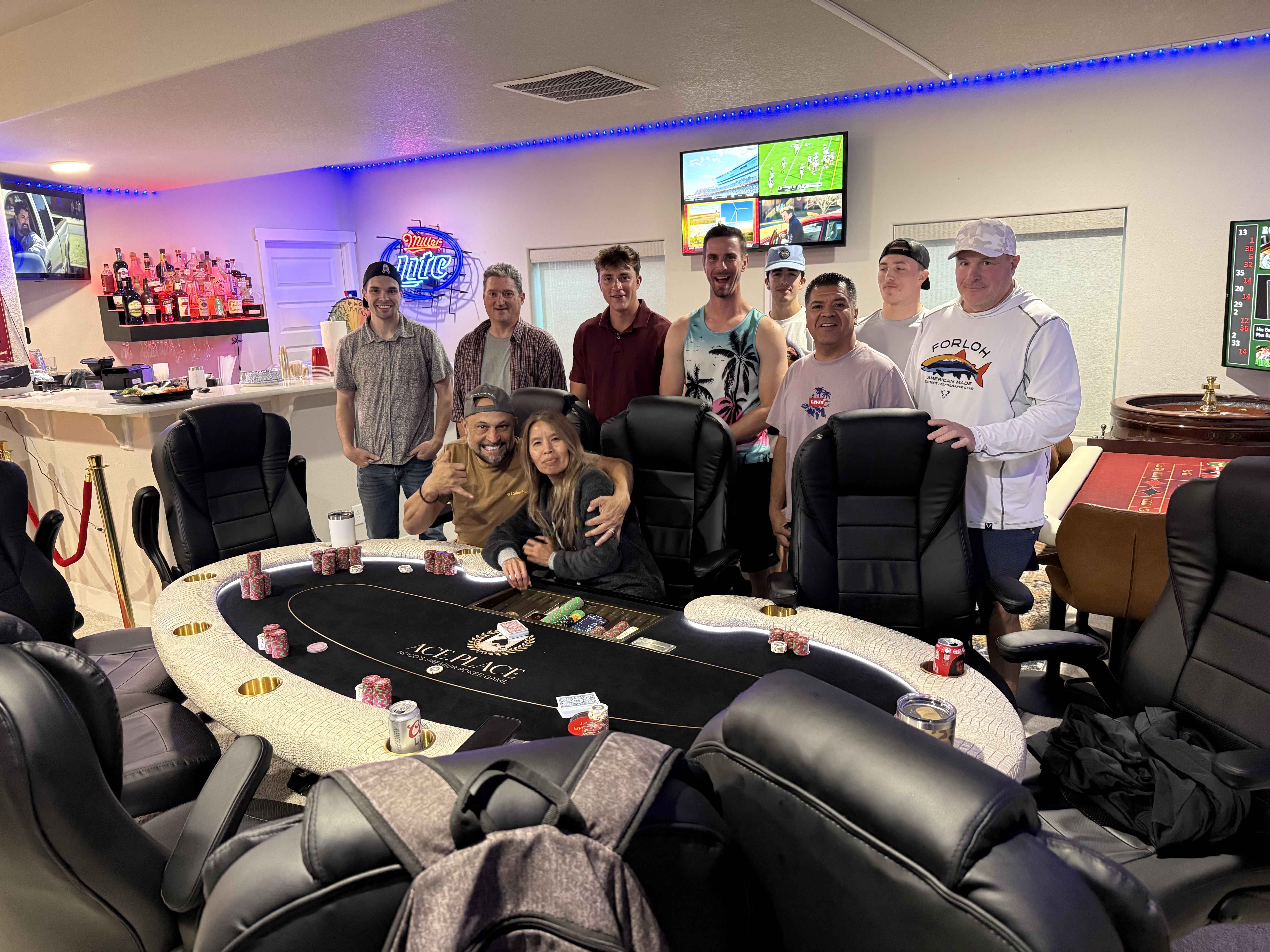 Players around the Ace.Place table